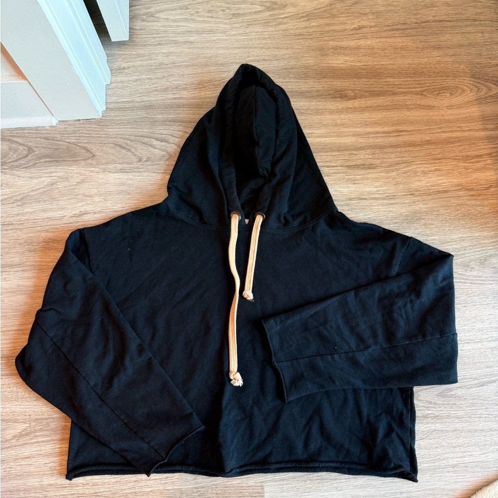 Black cropped hoodie with white drawstring
